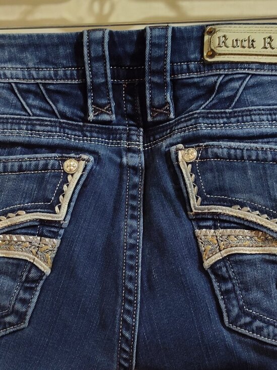 Rock Revival Denim - Rock Revival size 30 Fleur de Lis Flap back Pockets Designs Boot cut Jeans